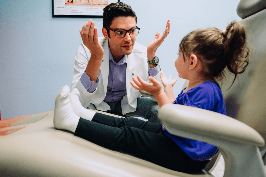 CDP Doctor interacting with young female patient